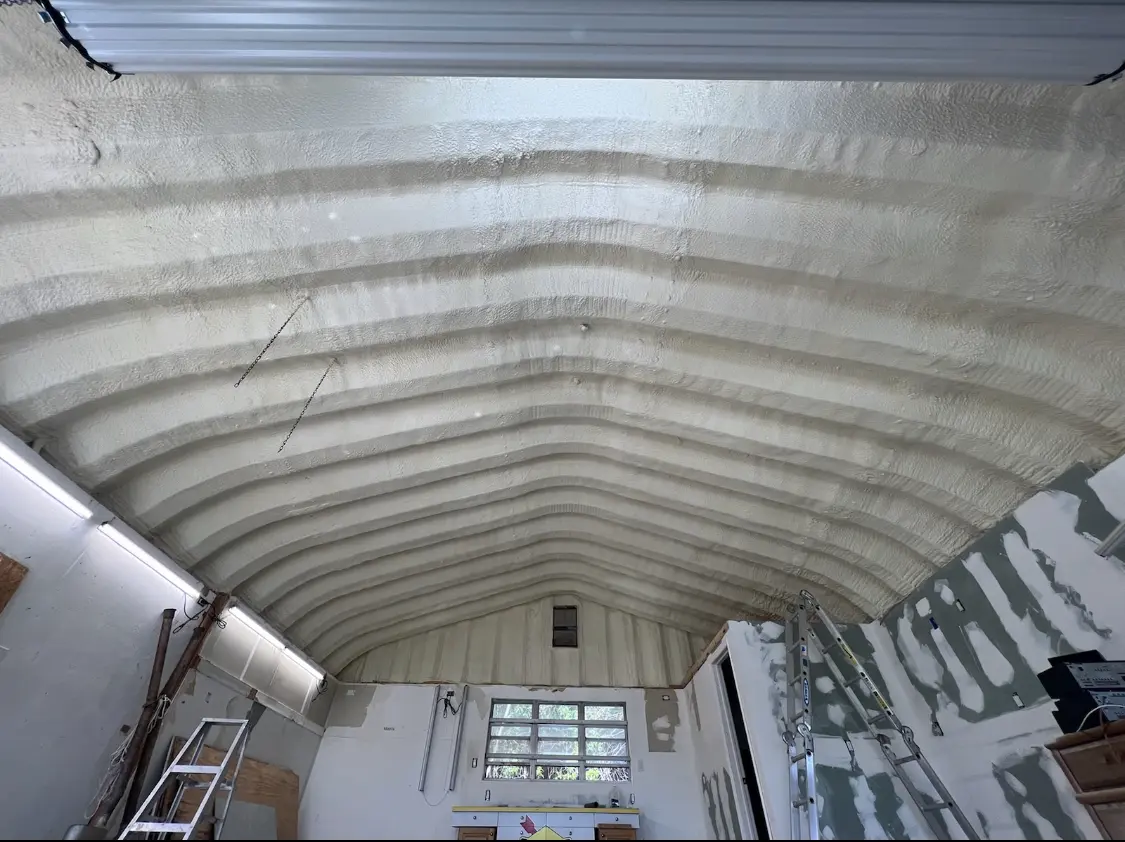 Spray polyurethane foam applied to the underside of a metal roof deck in Laguna Hills
